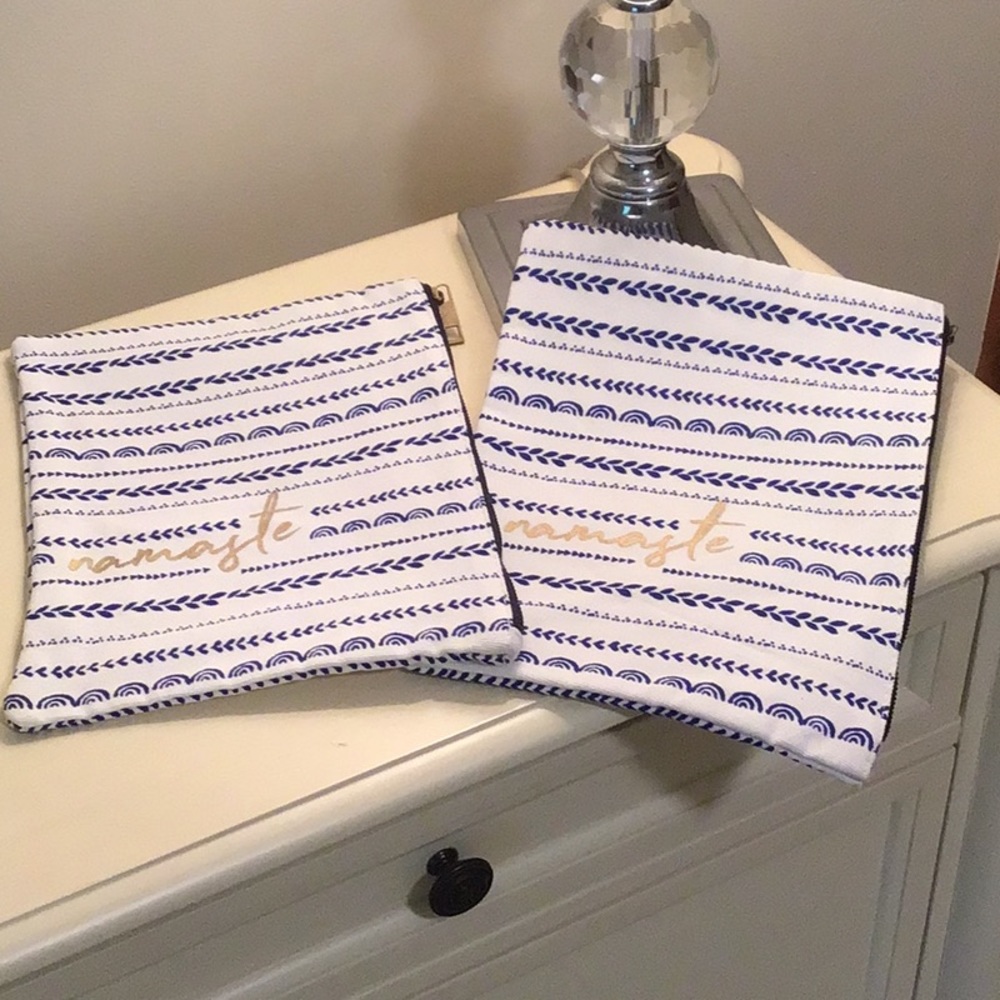 NWOT: 2 Namaste Zip Pouch